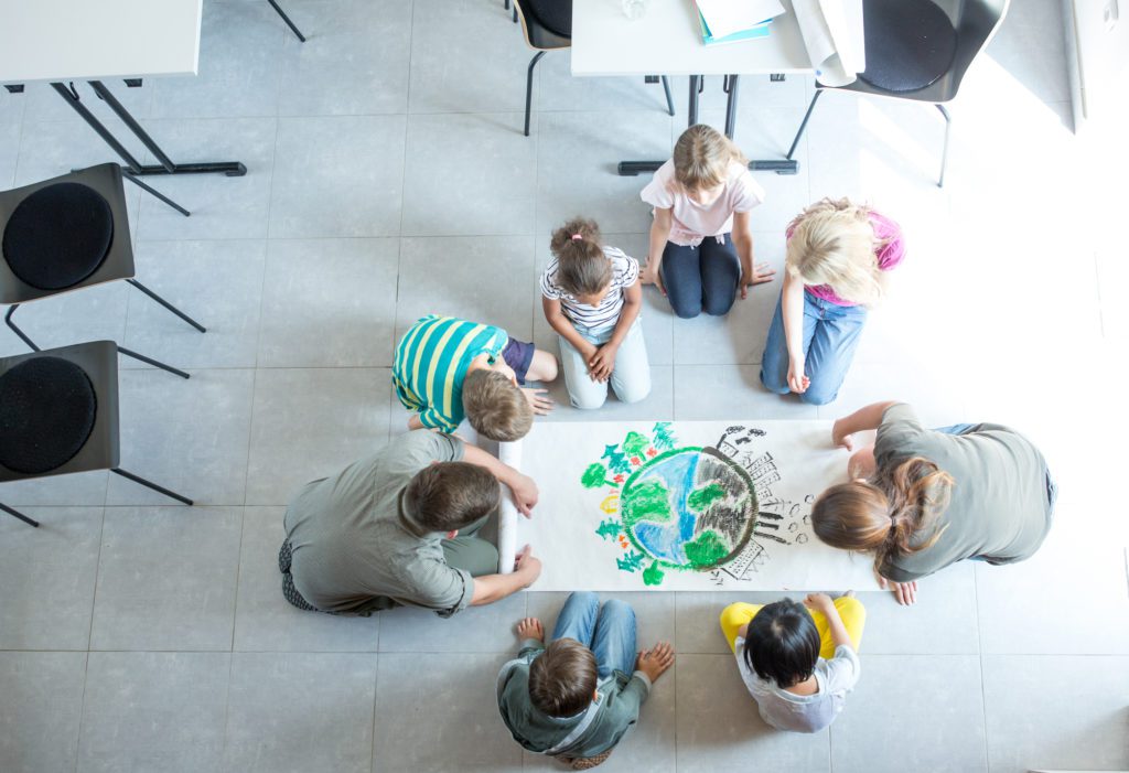 Multiethnic group of kids at school or summer camp.