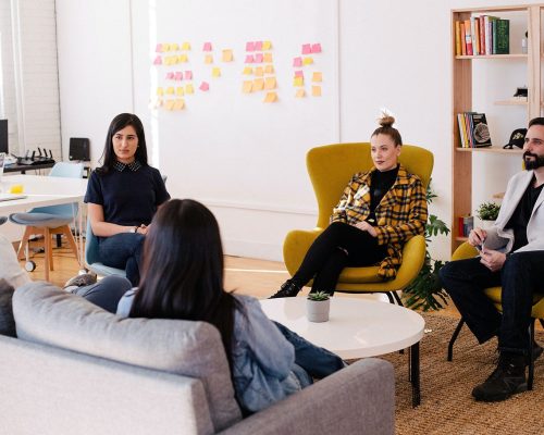 A group of people in a room.